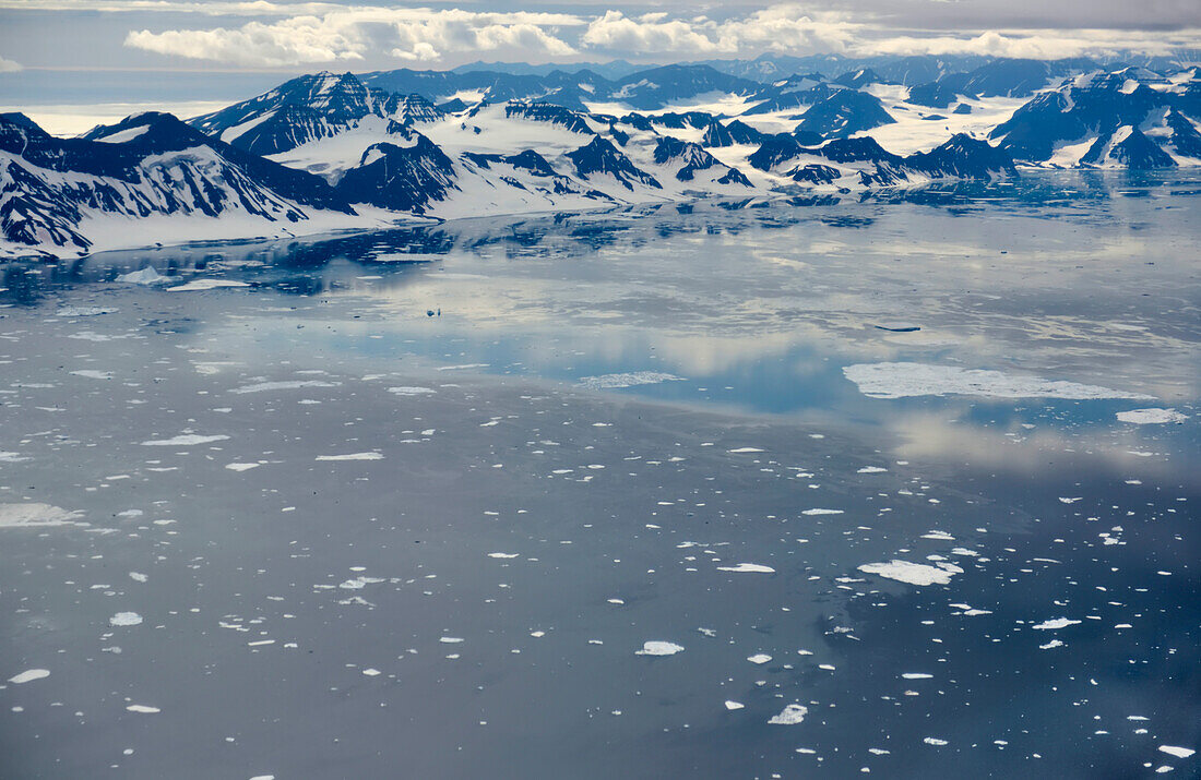 View out of the window of the Twin Otter plane during our flight up from Akureyri in Iceland up to Constable Point on the east coast of Greenland; Northeast Greenland , Greenland