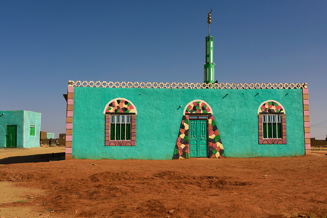 A typical Nubian mosque with vivid colors.; Sudan, Africa.