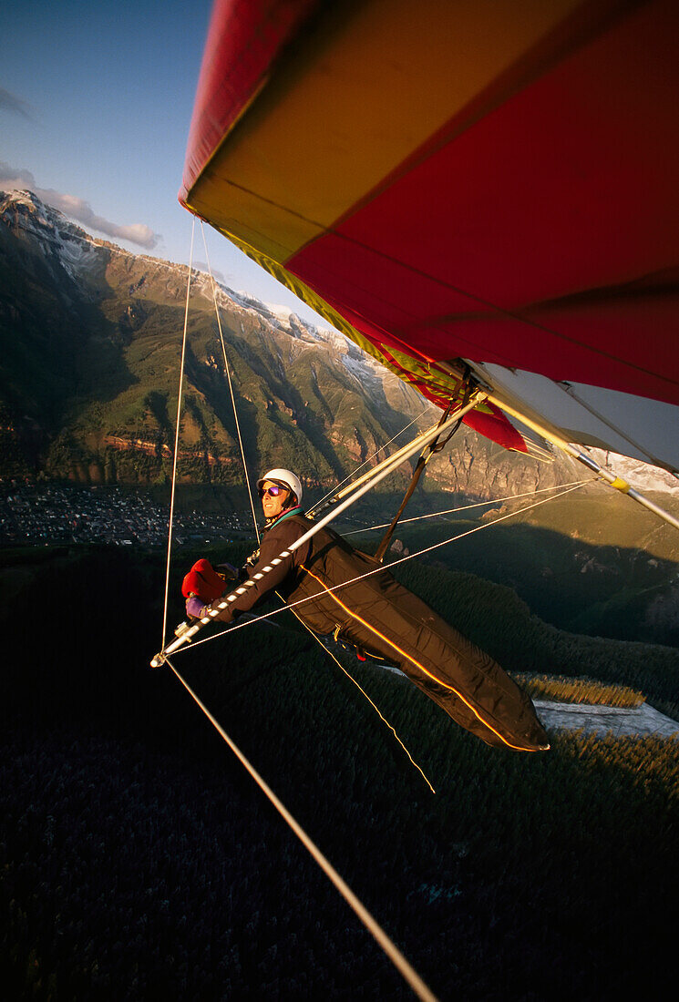 Hang glider over Telluride, Colorado.; Telluride, Colorado.