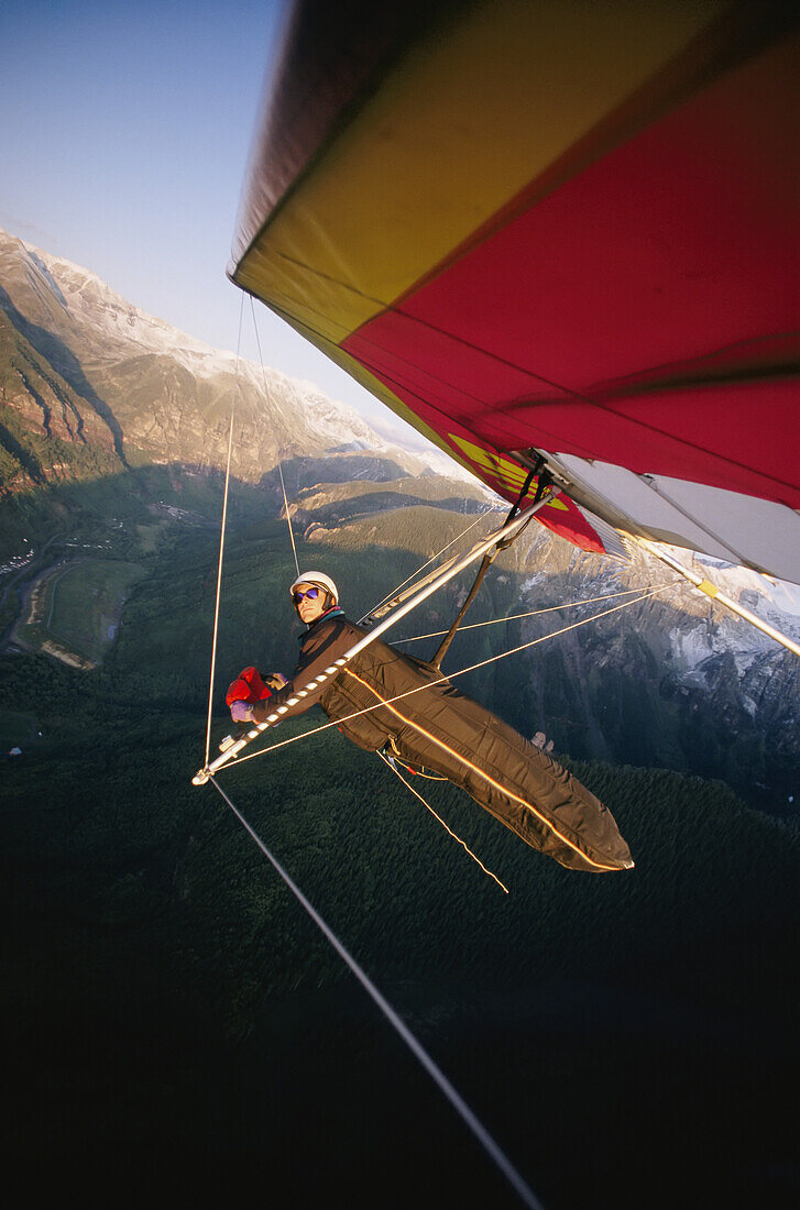 Hang gliding with wing-mounted camera over Telluride.; TELLURIDE, COLORADO.