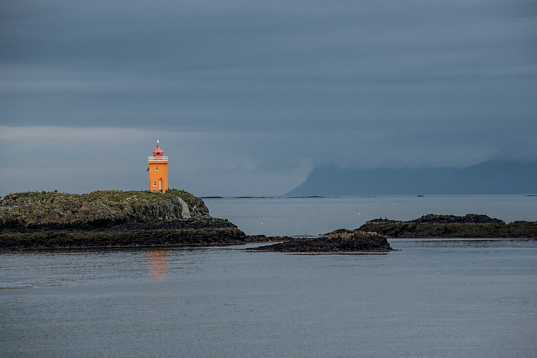 Klofningur Lighthouse on the small island of Klofningur off the shore of Flatey Island, part of a cluster of about forty large and small islands and islets located in Breiðafjörður on the northwestern part of Iceland; Western Islands, Iceland