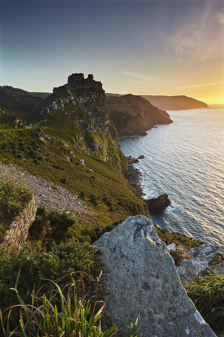 Sunset over cliffs at the Valley of Rocks, Lynton, Exmoor National Park; Devon, England, Great Britain