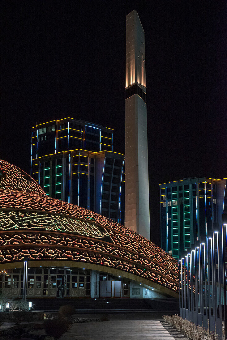 Close-up of the Aimani Kadyrova Mosque illuminated at night; Argun, Chechen Republic, Russia