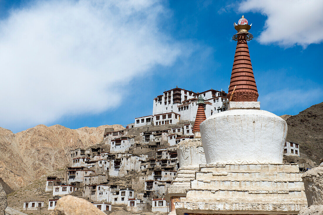Close-up of Stupas with mountainside building complex of the Tibetan Buddhist, Takthok Monastery at Sakti; Jammu and Kashmir, India