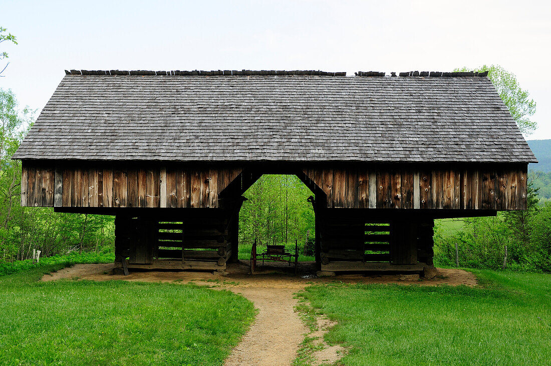 Cantilever barn at the Tipton homestead in Cades Cove.; Cades Cove, Great Smoky Mountains National Park, Tennessee.