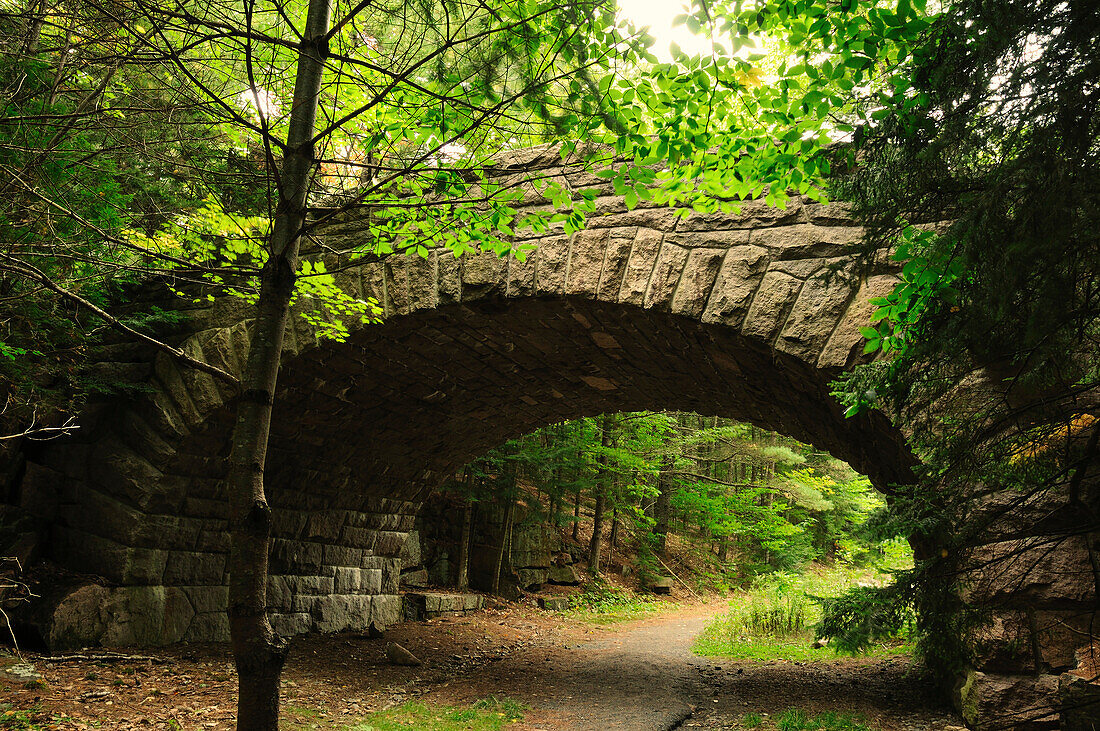 Carriage road bridge made of granite near Bubble Pond.; Acadia National Park, Mount Desert Island, Maine.