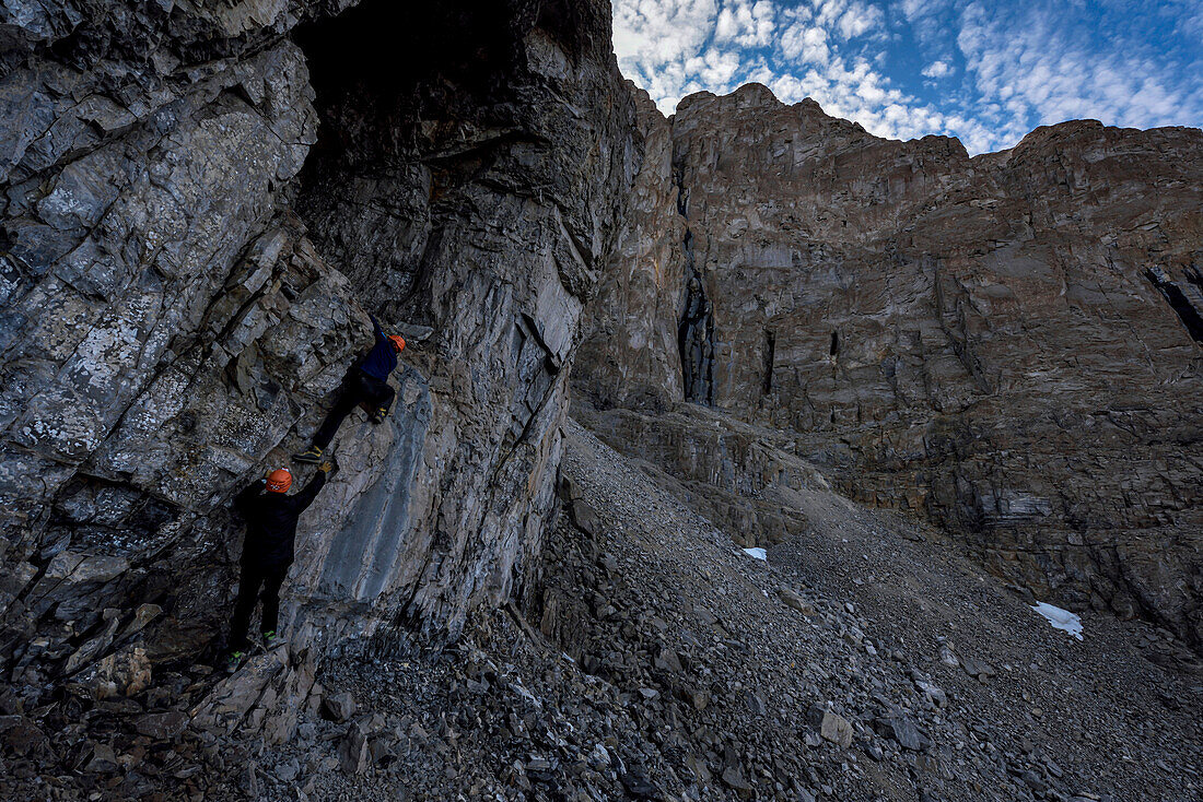 Meanwhile the other two members of the team were very keen on finding the most northern cave on Earth ever explored. Expedition team members had set themselves that challenge, so they began searching the most northern cliff for caves. To their amazement, there were several caves to examine. This set of images were taken during their quest on achieving their goal. Not content with discovering the most northern cave on Earth ever explored, they found another one that unfortunately for them a french team had already visited and built a giant cairn of rocks in the entrance abouve a 6m vertical roc