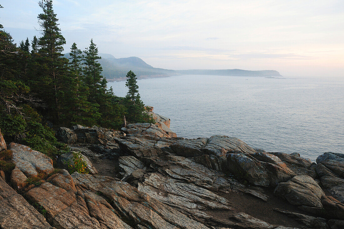 Scenic view of the rocky Maine coastline at sunrise.; Acadia National Park, Mount Desert Island, Maine.