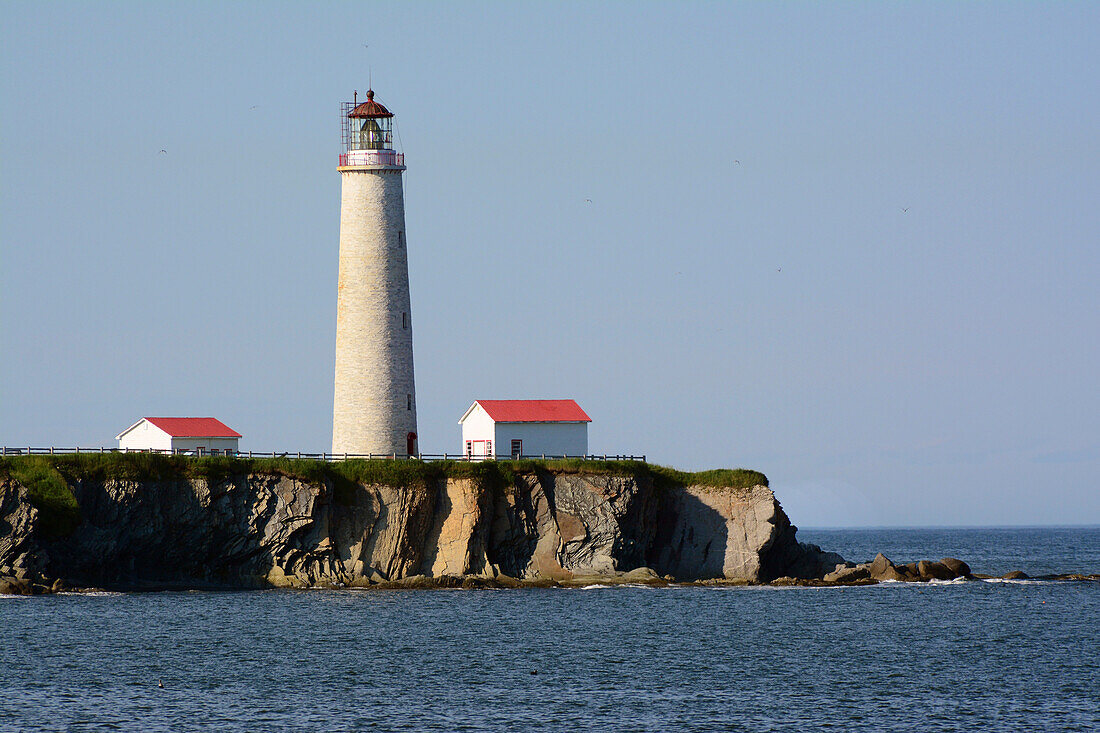 A scenic view of the Cap des Rosiers lighthouse, the tallest lighthouse in Canada.; Cap-des-Rosiers, Gaspe Peninsula, Quebec, Canada.