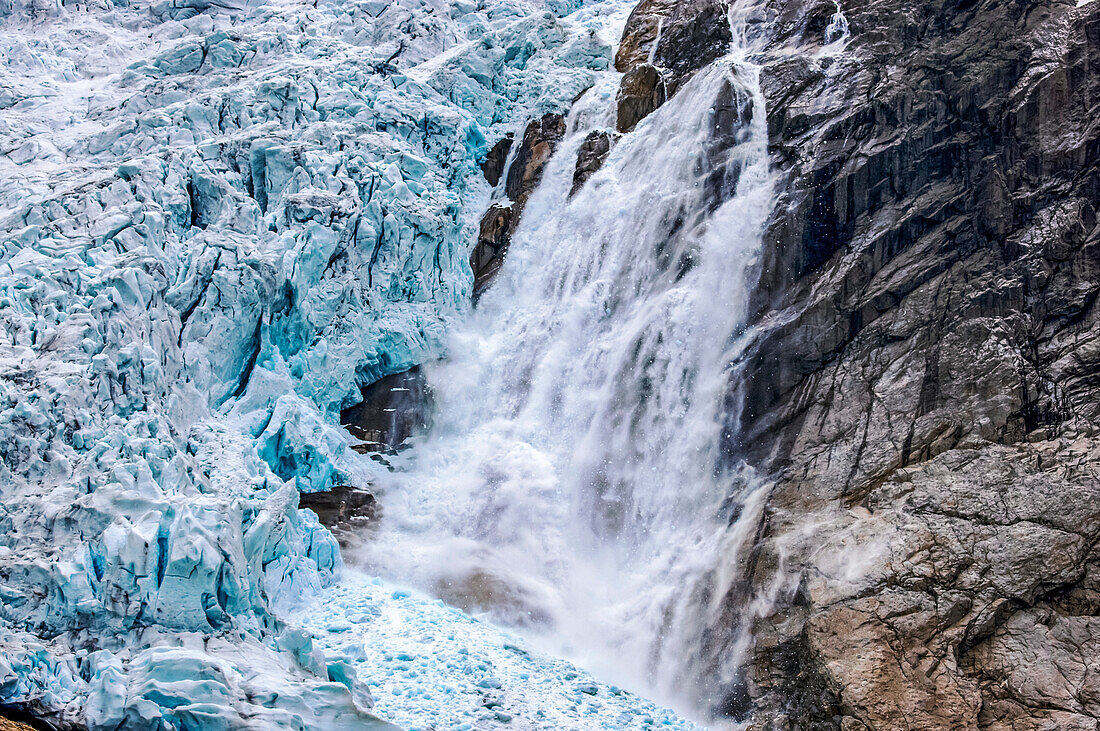 Snow slide at Briksdalbreen, the Briksdal Glacier in Jostedal Glacier National Park, Norway; Norway
