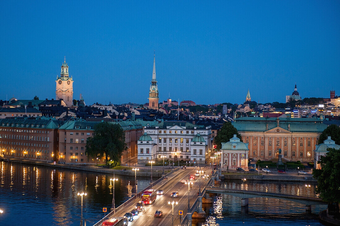 Lights Illuminating The City And Road At Dusk; Stockholm Sweden