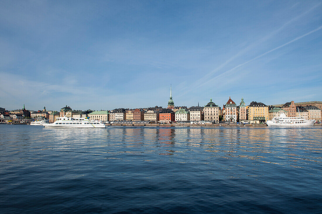 Boats In The Water With View Of Buildings Across The Water; Stockholm Sweden