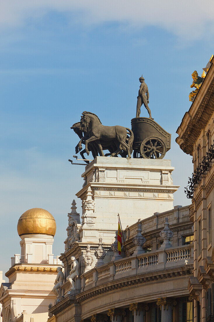 Quadriga On Roof Of Banco De Bilbao Building Four Horses Drawing A Two Wheeled Chariot; Madrid Spain