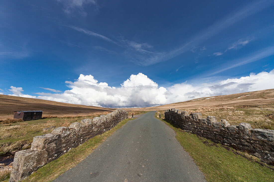 A Road Lined With A Stone Wall; Swaledale England