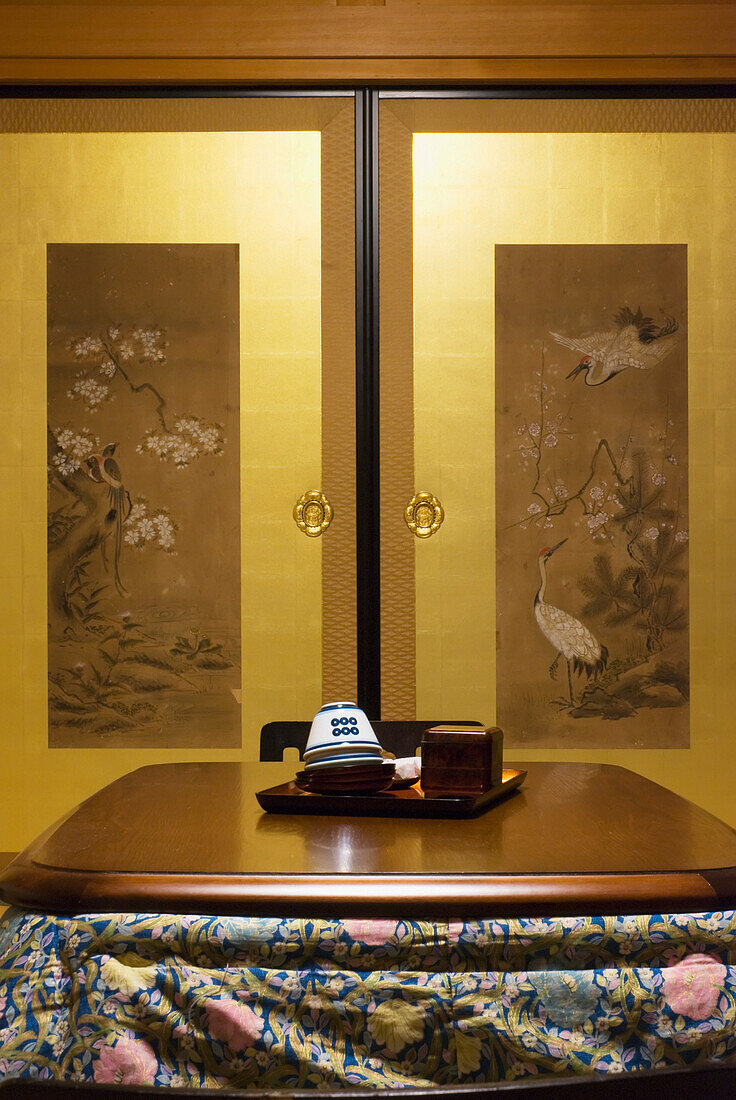 Japanese Table With Heating Blanket And Decorated Doors In The Background; Koyasan Wakayama Japan