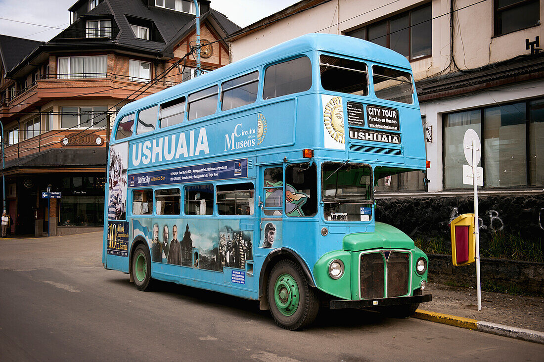 A Double-Decker Bus On The Street; Ushuaia, Tierra Del Fuego, Argentina