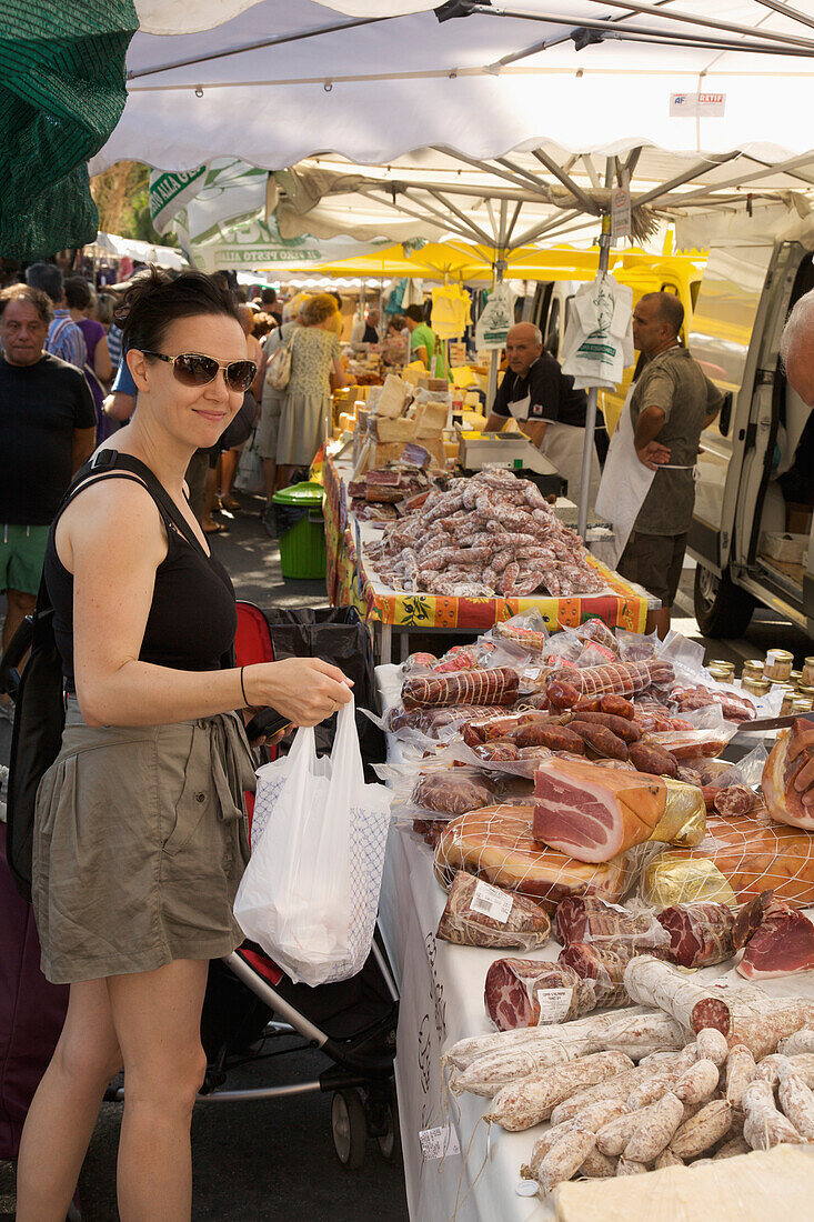 A Woman Shops At The Market; Ventimiglia Italy