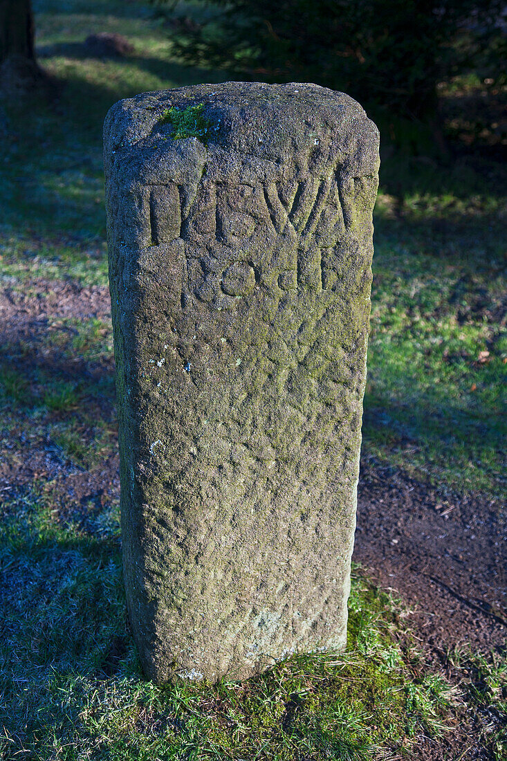 An Old Stone Marker With Worn Inscription; Derbyshire, England