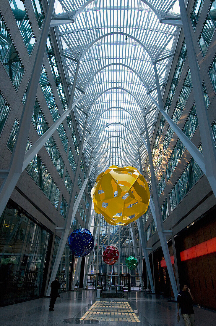 Colourful Hanging Round Objects In A Corridor With A Rounded Ceiling Of Skylights; Toronto Ontario Canada