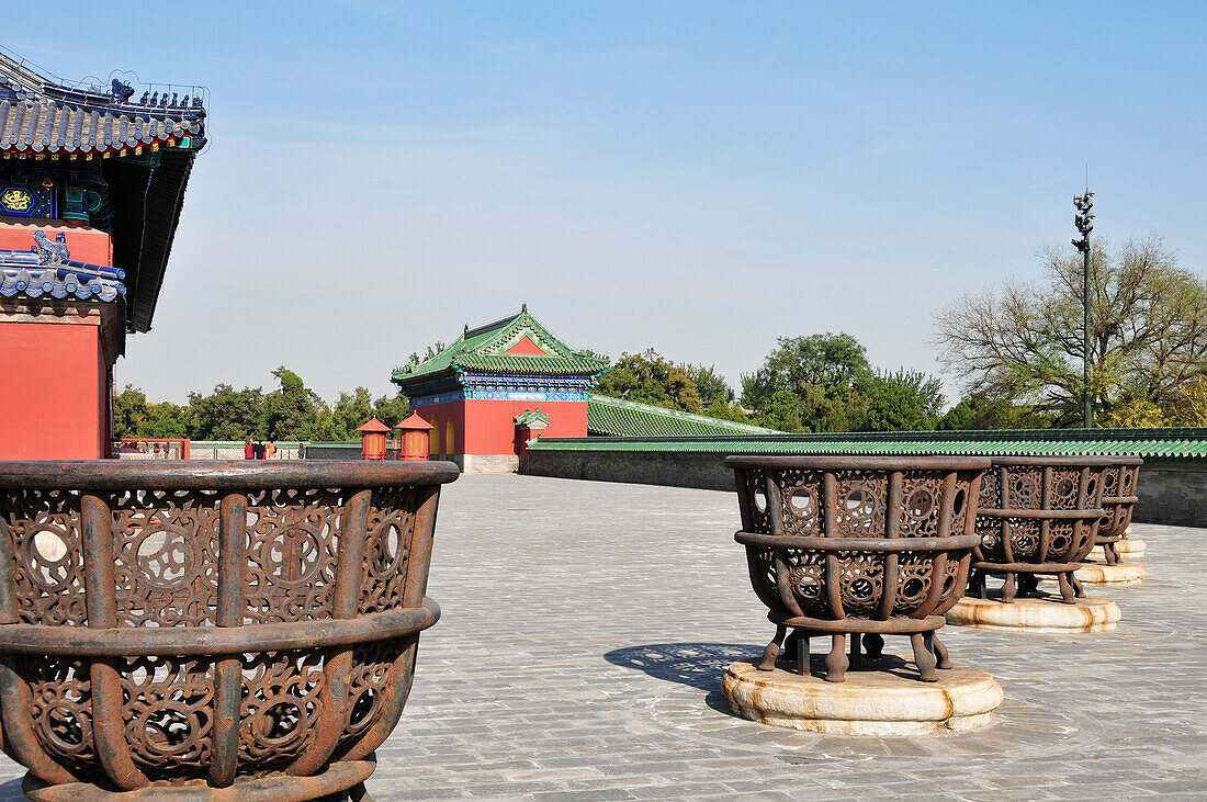 Metal Bowls In A Row Along A Path; Beijing China