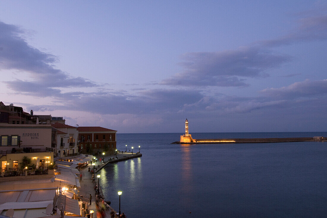 Greece, Crete, 16th Century Venetian Harbor and lighthouse, Evening.
