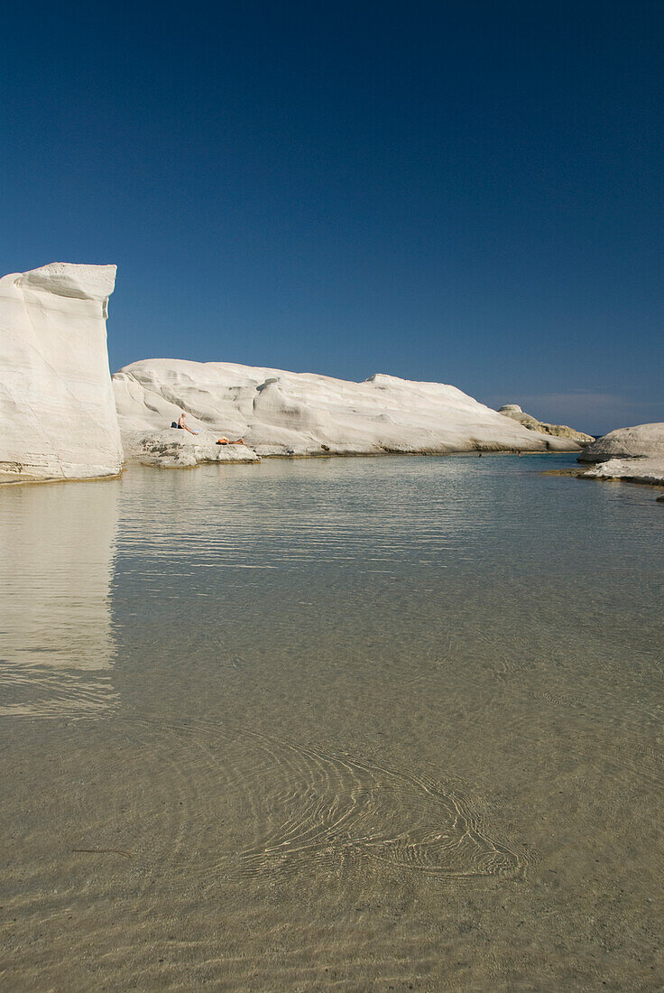 Greece, Cyclades, Island of Milos, Volcanic formations make up Sarakiniko Beach.