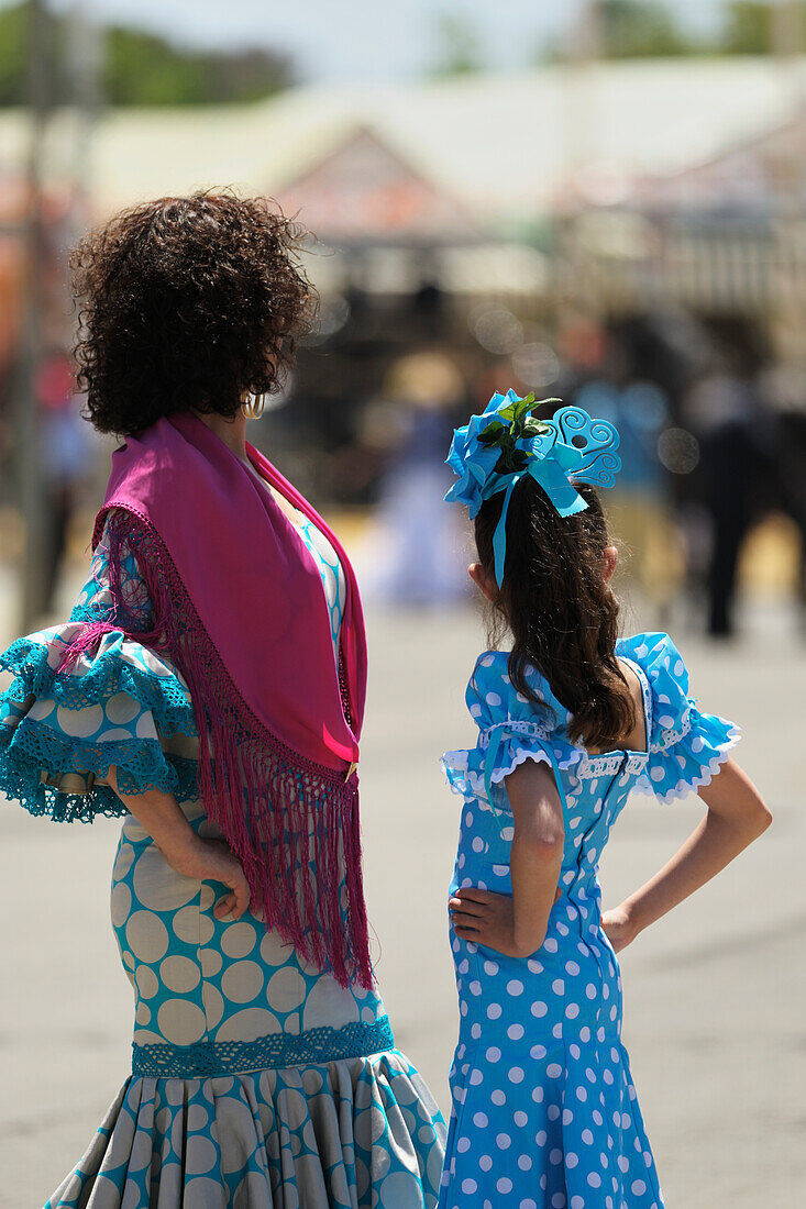 A Woman And Girl Dressed Up For The April Fair; Seville Andalusia Spain