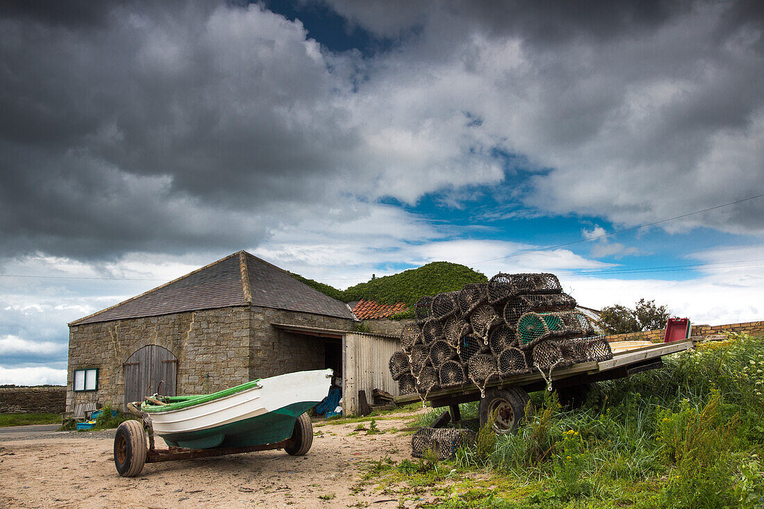 A Boat And Traps In A Trailer On The Beach; Boulmer Northumberland England