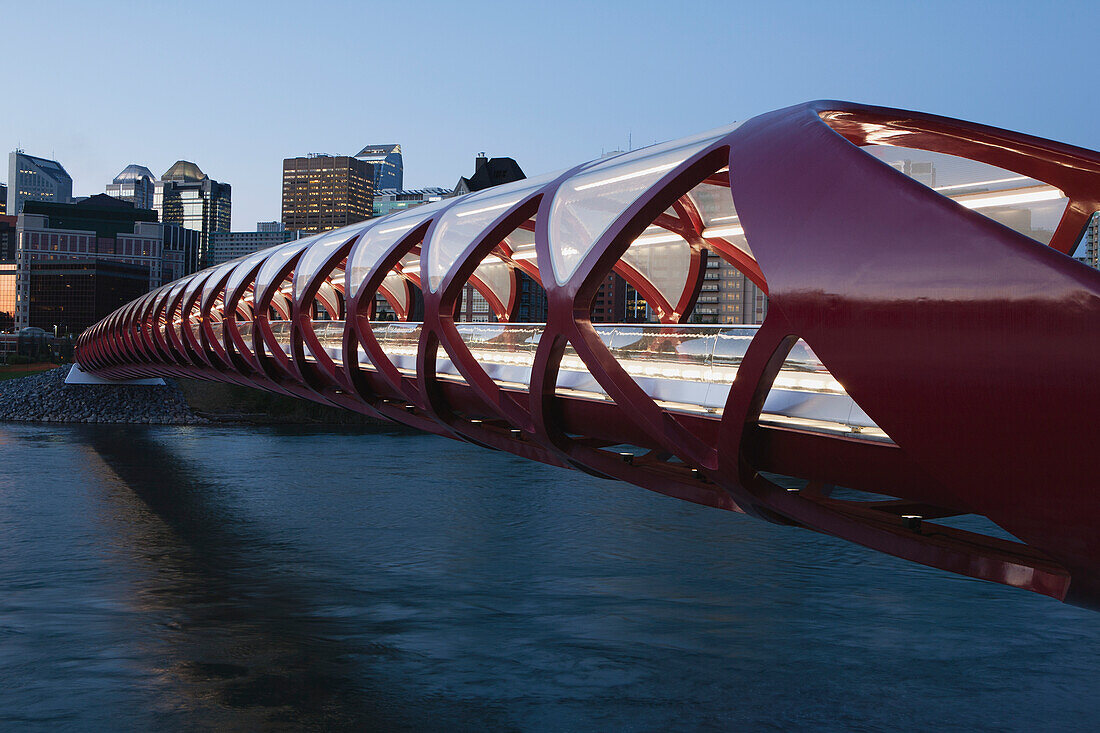 Red Bridge Over The Bow River At Twilight With Lights; Calgary Alberta Canada