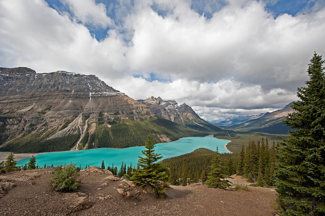 A Turquoise Mountain Lake And The Canadian Rocky Mountains; Alberta Canada
