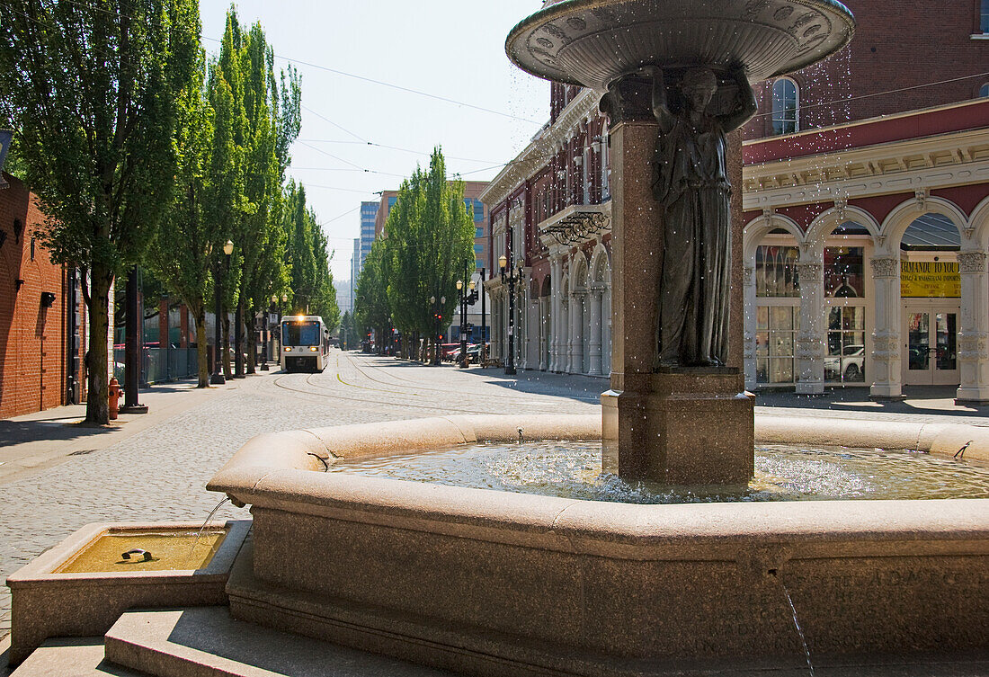 Water Fountain And Streetcar In Downtown Portland; Portland Oregon United States Of America