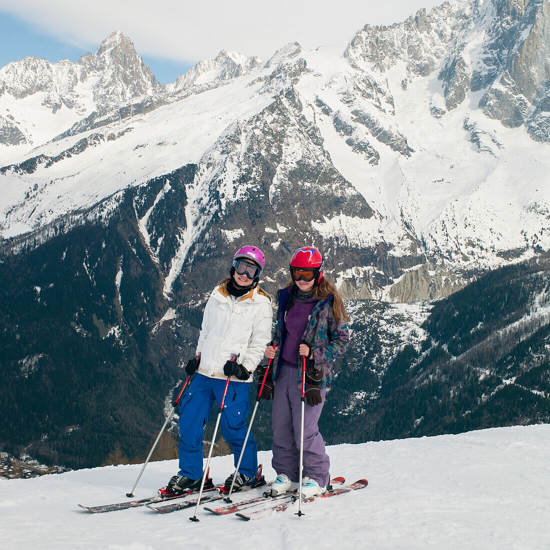 Two Girls Skiing In The French Alps; Chaminox-Mont-Blanc Rhone-Alpes France