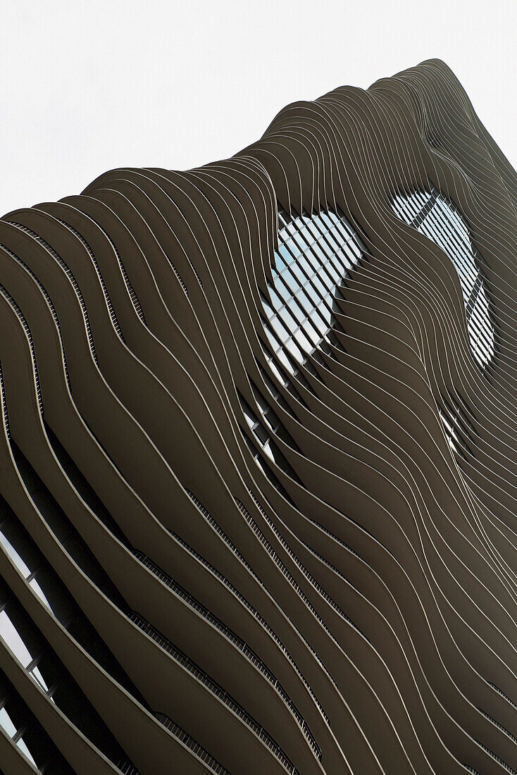 Low Angle View Of A Building With Curved Ledges For A Wavy Facade; Chicago Illinois United States Of America