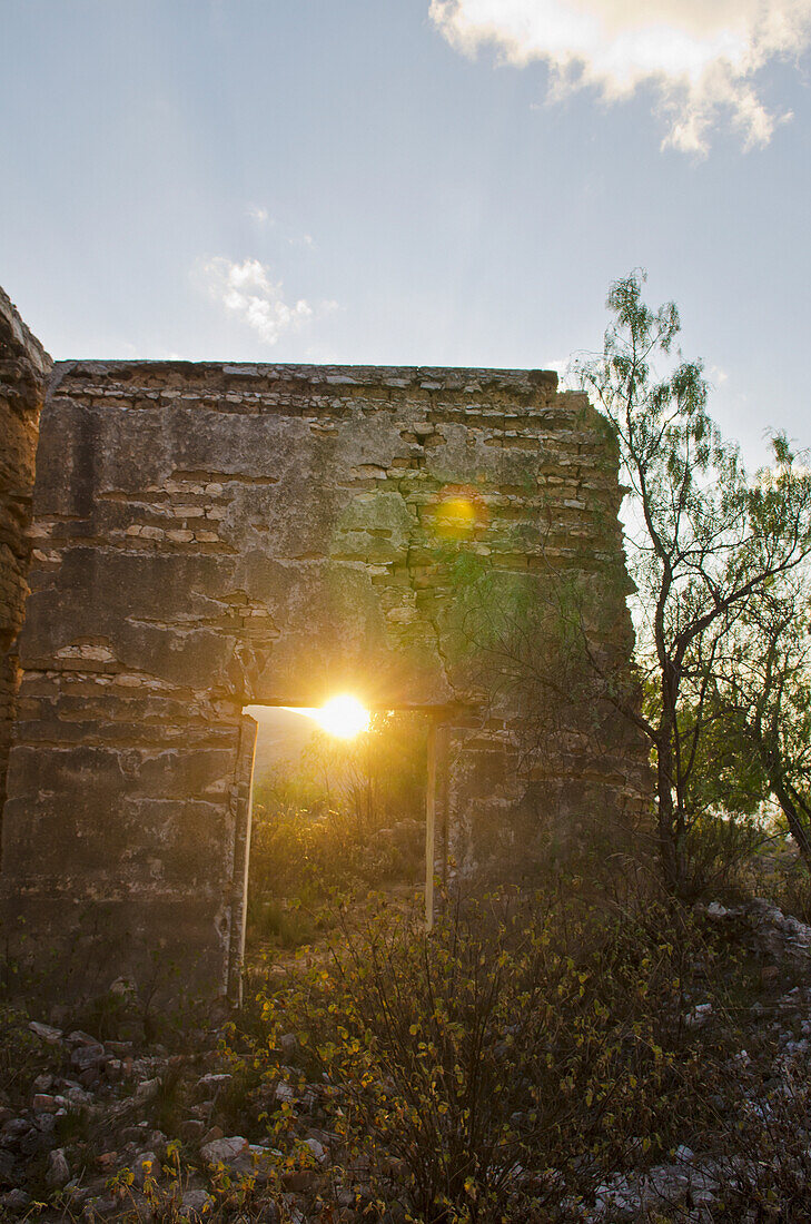 View of old demolished house at sunset; Pozos, Guatajuato, Mexico