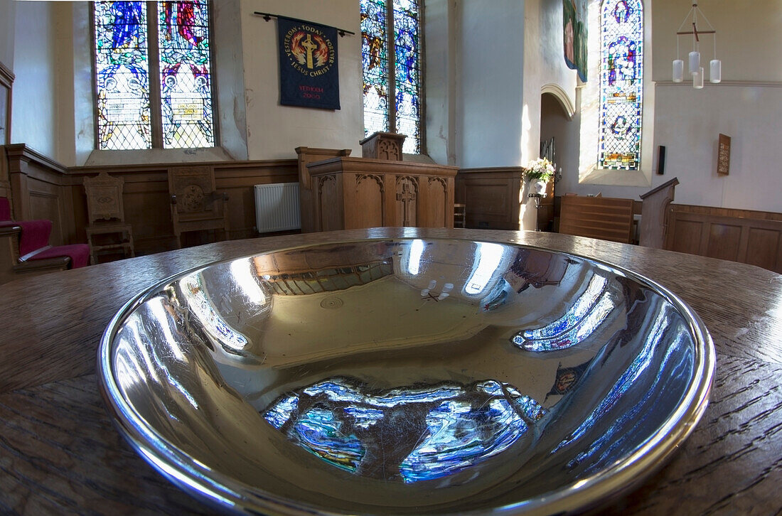 UK, Scotland, Scottish Borders, Yetholm, Silver metal bowl in church interior