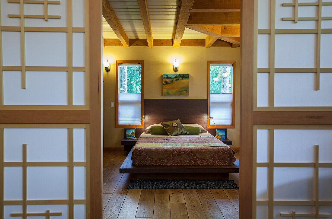 Canada, British Columbia, Japanese inspired master bedroom in eco friendly cottage; Vancouver Island