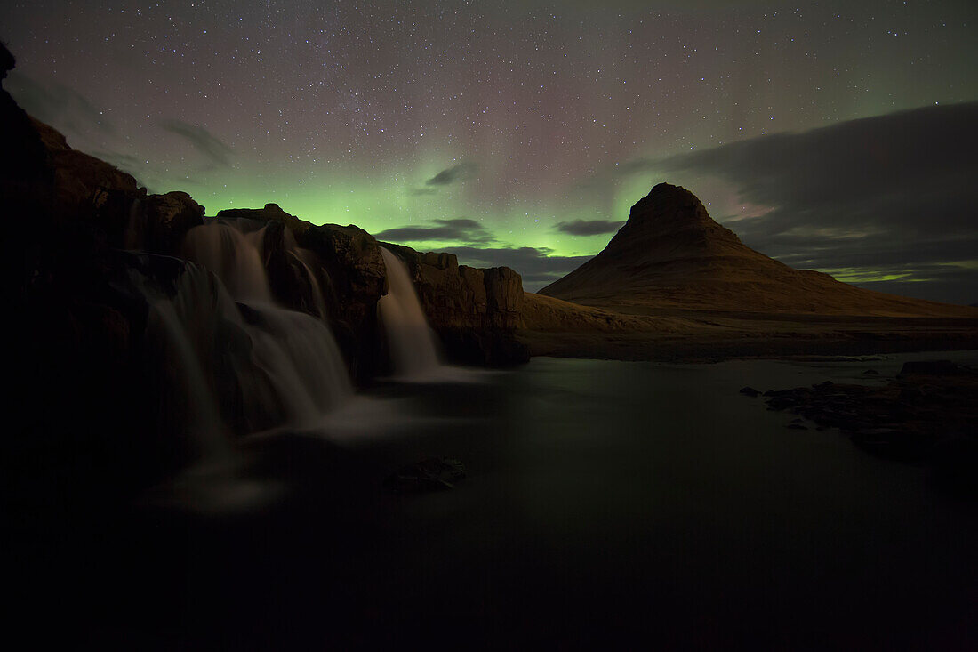 Northern Lights Or Aurora Borealis Over Kirkjufell In The Town Of Grundarfjorthur, Snaefellsness Peninsula; Grundarfjorthur, Snaefellsness, Iceland