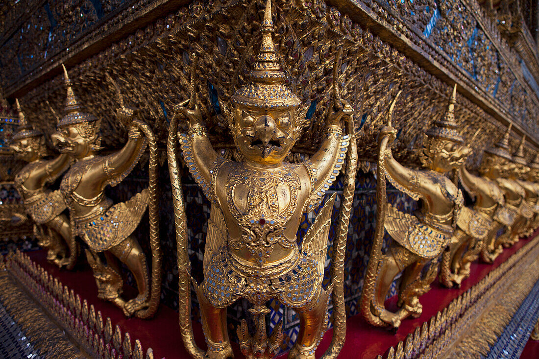 Golden Garudas Lined Up Around The Main Temple; Bangkok, Thailand