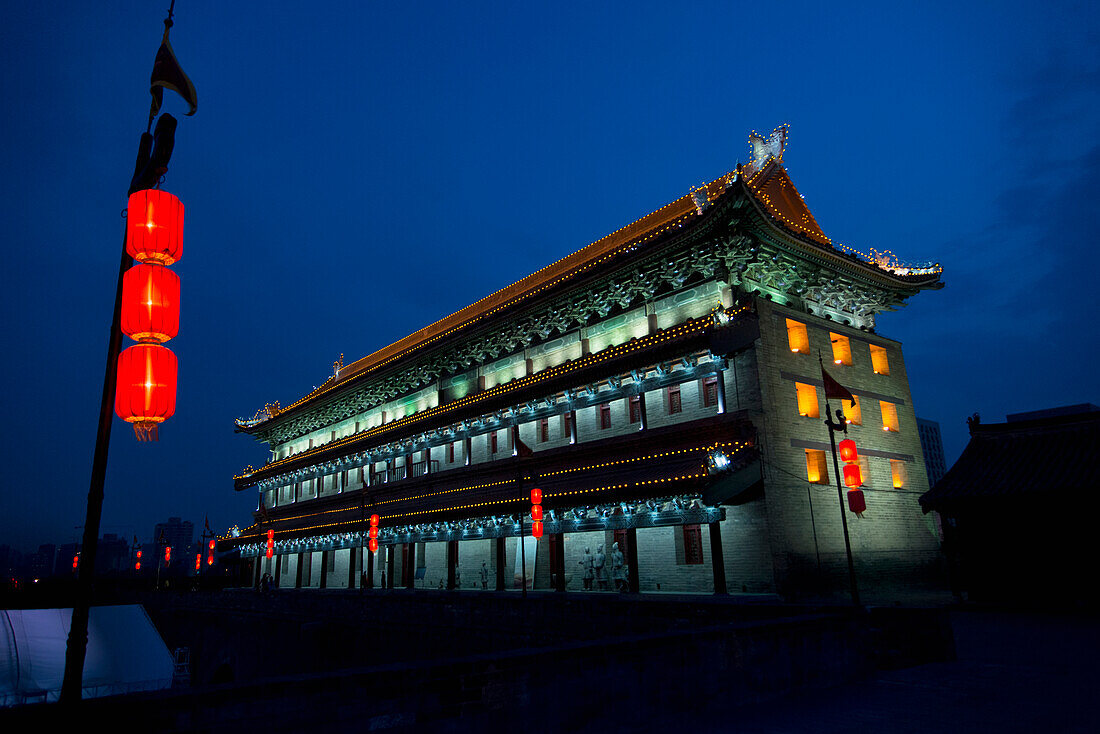 A Building Illuminated At Night Along The Lianhu Ancient City Wall; Xi'an, Shaanxi, China