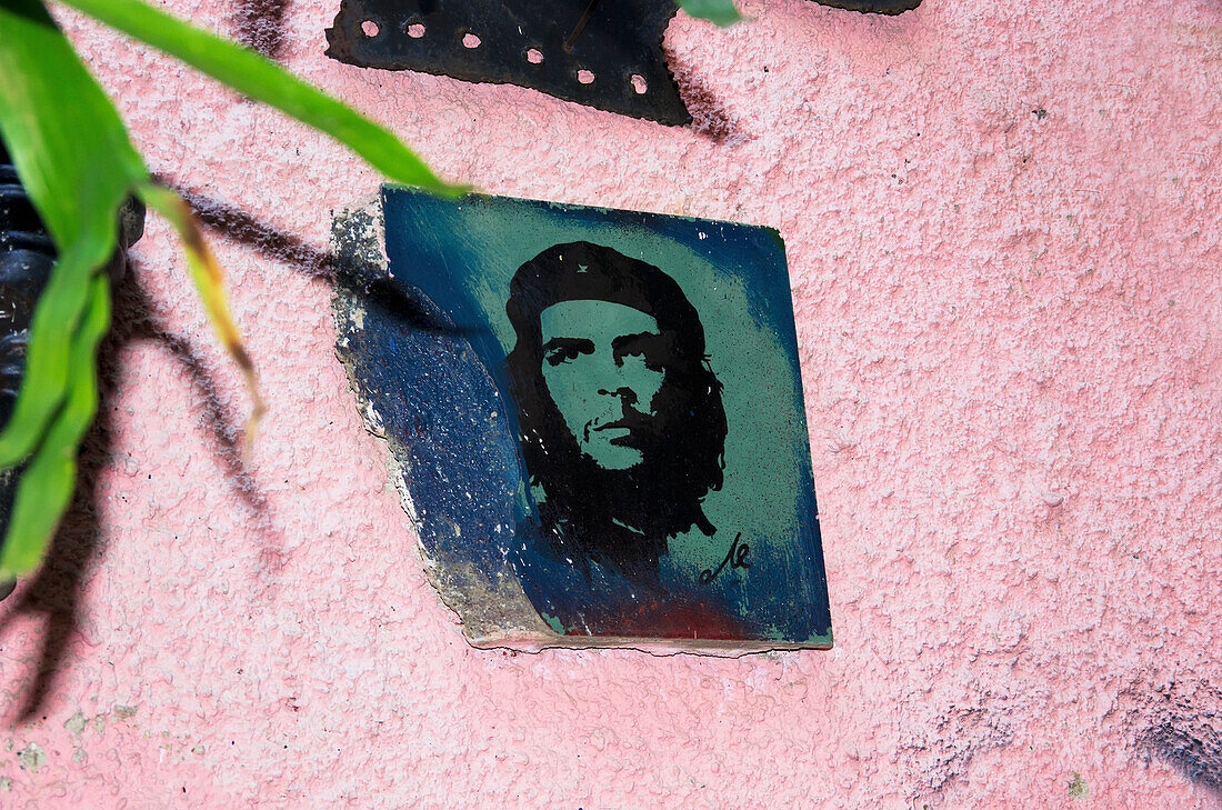 Small Portrait Of Che Guevara On A Pink Stucco Wall In Shop On Callejon De Hamel; Havana, Artemisa, Cuba