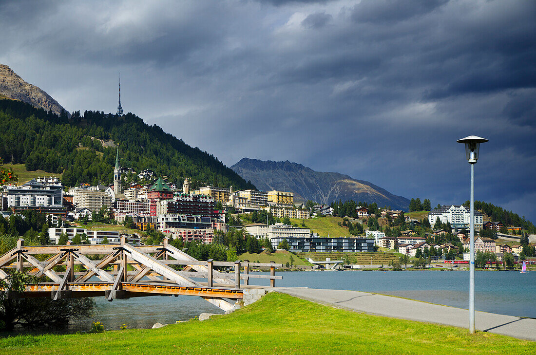 Storm Clouds Over A City In The Swiss Alps; St. Moritz, Grisons, Switzerland