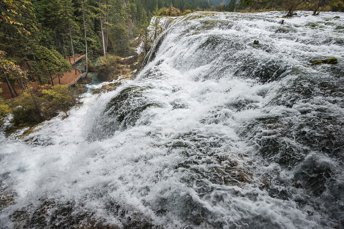 Huge Waterfall Cascade In Jiuzhaigou Valley National Park; Jiuzhaigou, Sichuan, China