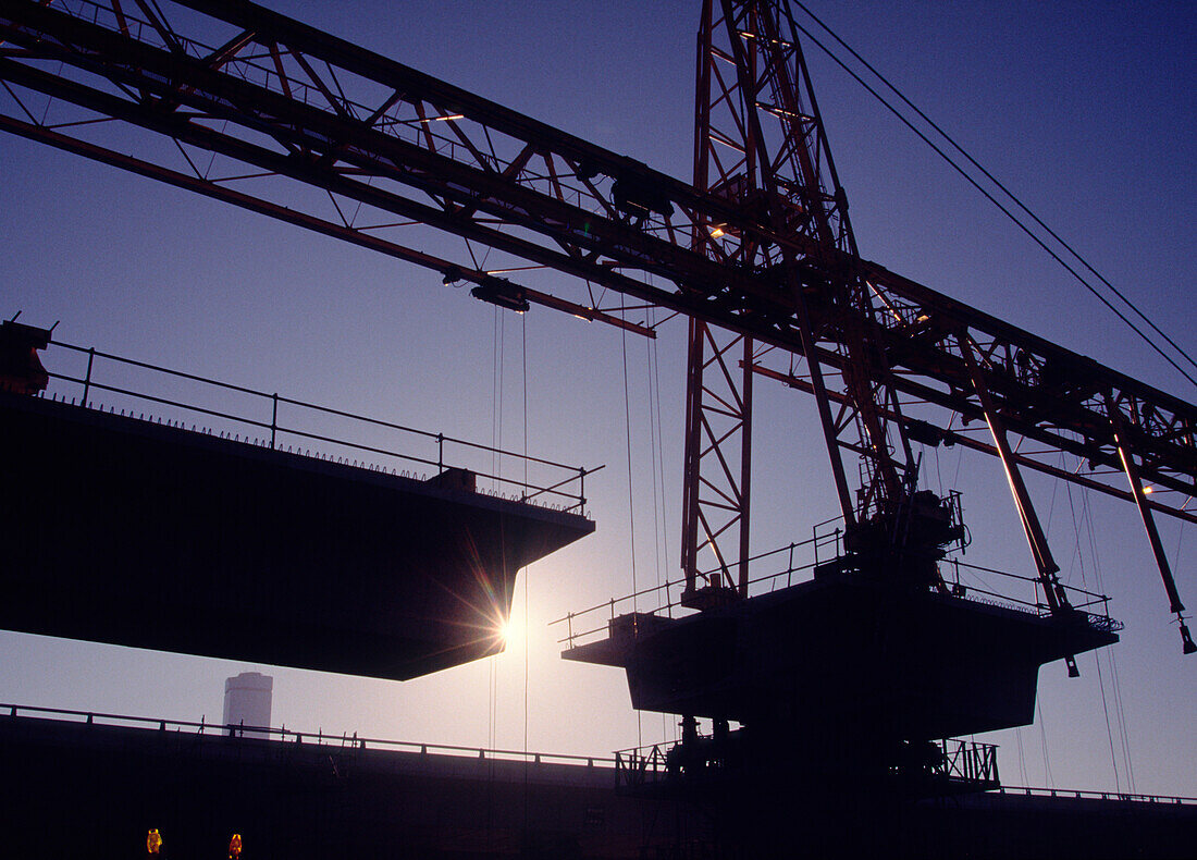 Freeway Bridge Construction, Cranes, Silhouette