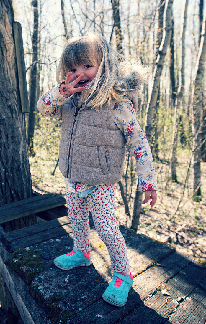 Portrait of 3 Year Old Girl Outdoors, Saskatchewan, Canada