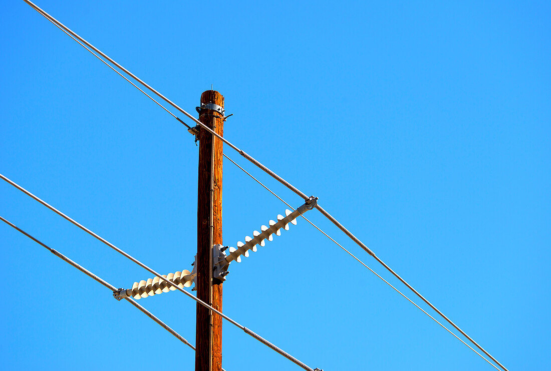 Hydro wires against blue sky, Canada