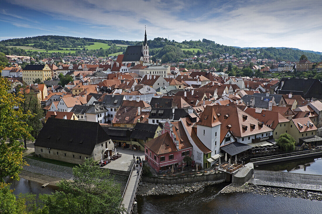 Scenic overview of Cesky Krumlov with Church of St Vitus in the background, Czech Republic.