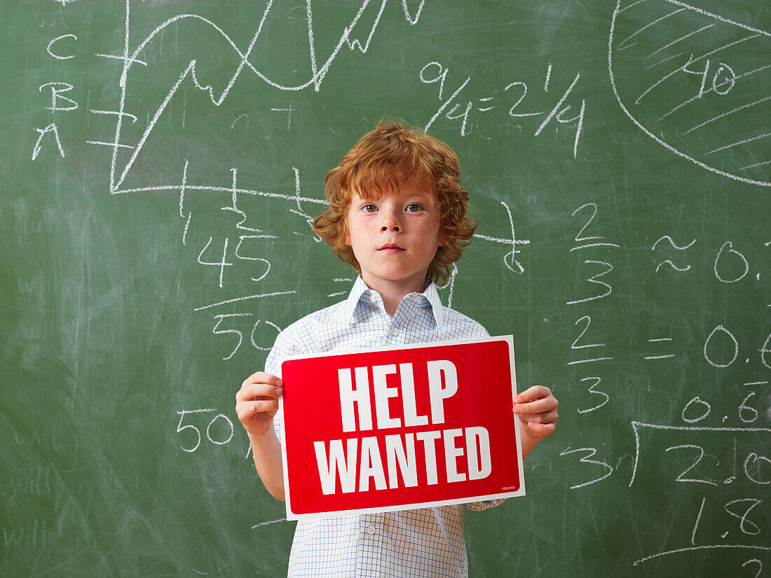 Boy Holding Help Wanted Sign