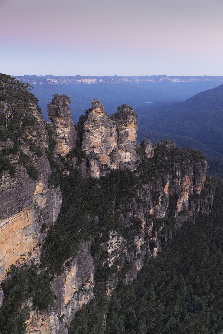 Three Sisters rock formation at sunset in the Blue Mountains National Park in New South Wales, Australia