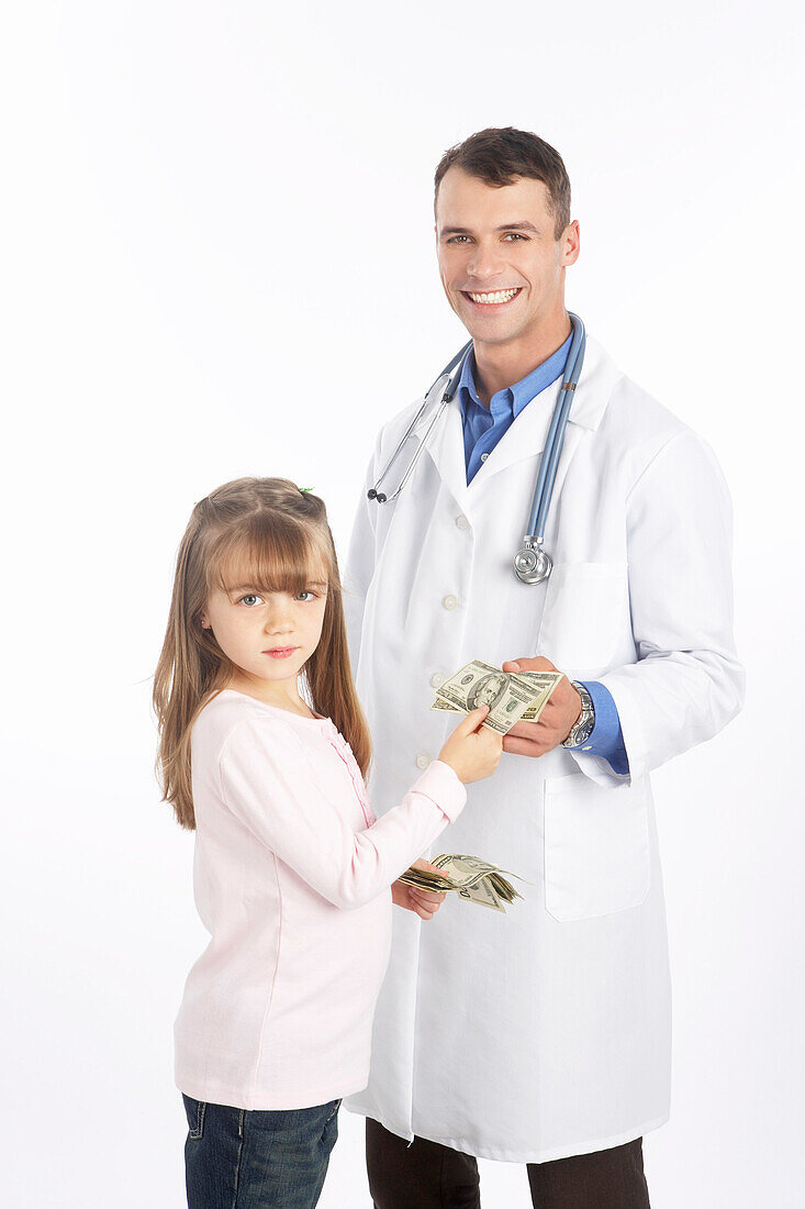 Young Girl Giving Money to Doctor