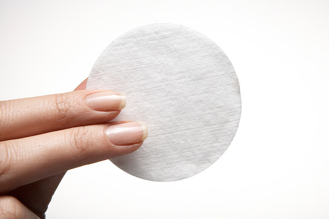 Close-up of Woman Holding Cotton Pad